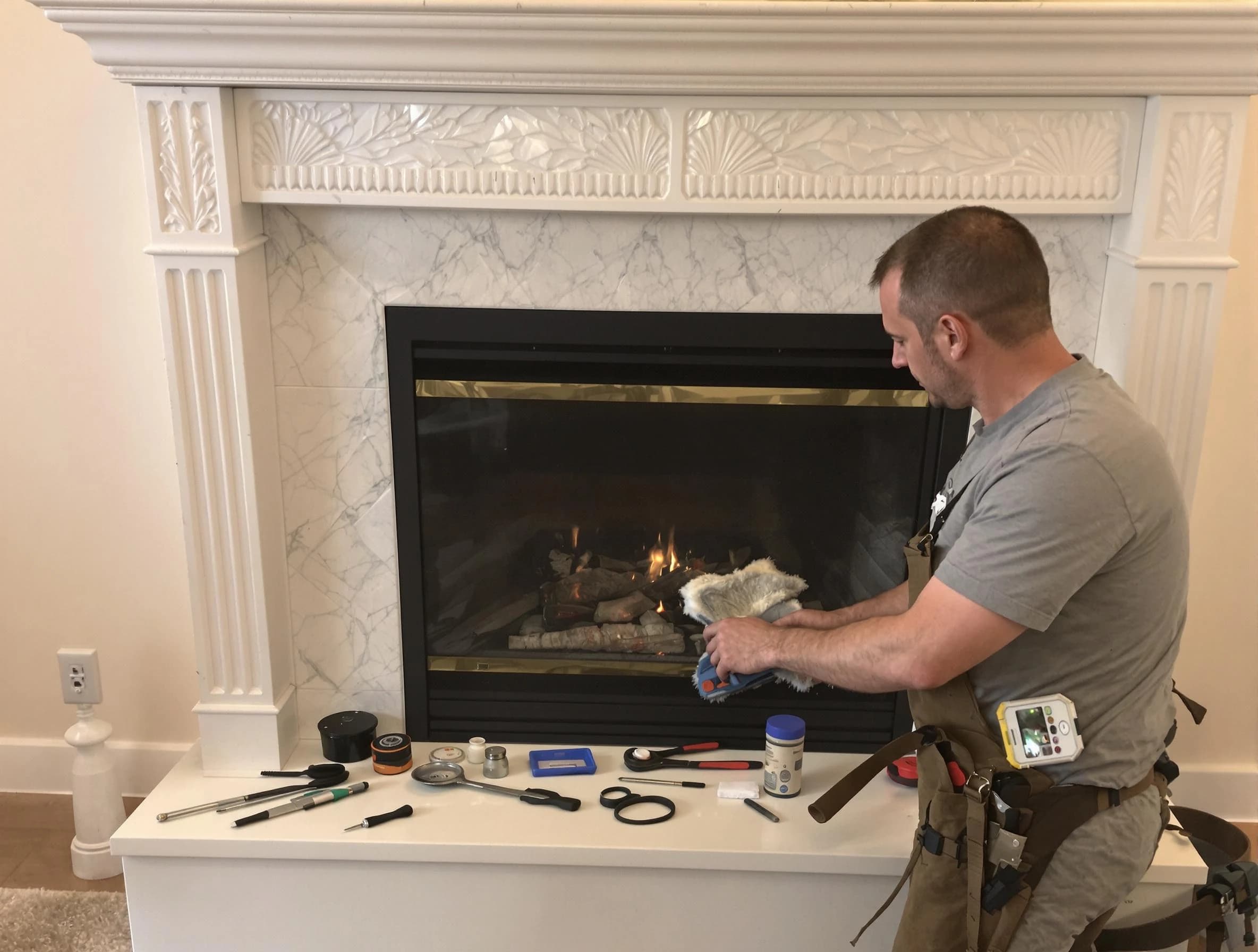 South Weber Chimney Sweep performing fireplace maintenance in South Weber, UT